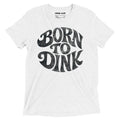 White tri-blend t-shirt featuring a bold vintage-inspired "Born to Dink" graphic across the front in black, designed for pickleball players with a retro athletic style.