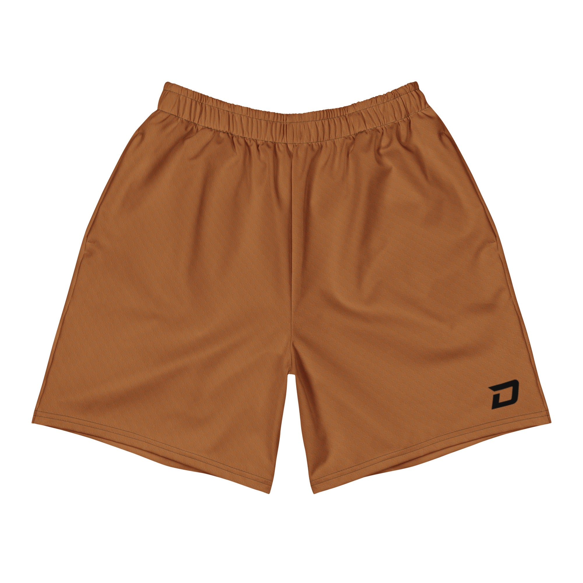 Front view of the Canyon Performance Shorts featuring a warm canyon brown performance fabric, white D Mark logo on the lower left leg, elastic waistband, athletic fit, moisture-wicking material, lightweight four-way stretch construction, and a clean minimalist design for pickleball, tournaments, training, travel, and everyday wear.