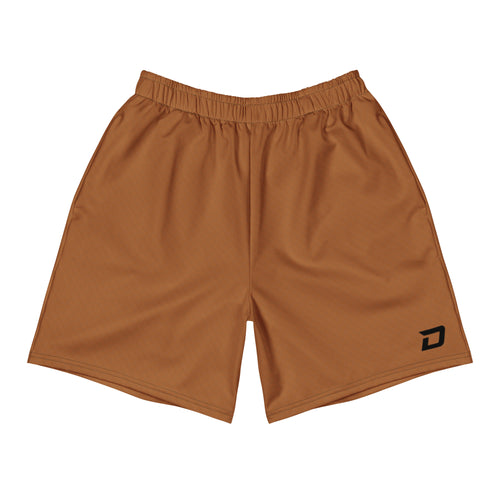Front view of the Canyon Performance Shorts featuring a warm canyon brown performance fabric, white D Mark logo on the lower left leg, elastic waistband, athletic fit, moisture-wicking material, lightweight four-way stretch construction, and a clean minimalist design for pickleball, tournaments, training, travel, and everyday wear.