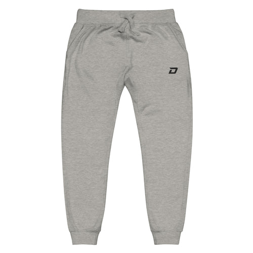 Front view of the Classic Joggers in gray featuring lightweight performance fabric, an embroidered black D Mark logo on the upper left thigh, elastic waistband with drawstring, tapered athletic fit, ribbed ankle cuffs, side pockets, and a minimalist design for pickleball, training, travel, recovery, and everyday wear.