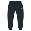 Front view of the Classic Performance Joggers in navy featuring lightweight performance fabric, an embroidered white D Mark logo on the upper left thigh, elastic waistband with drawstring, tapered athletic fit, ribbed ankle cuffs, side pockets, and a minimalist design for pickleball, training, travel, recovery, and everyday wear.