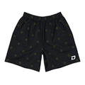 Front view of the Court Ball Performance Shorts featuring a black performance fabric with an all-over neon green pickleball pattern, white D Mark logo on the lower left leg, elastic waistband, athletic fit, moisture-wicking material, lightweight four-way stretch construction, and a bold modern design built for pickleball, tournaments, training, and everyday wear.