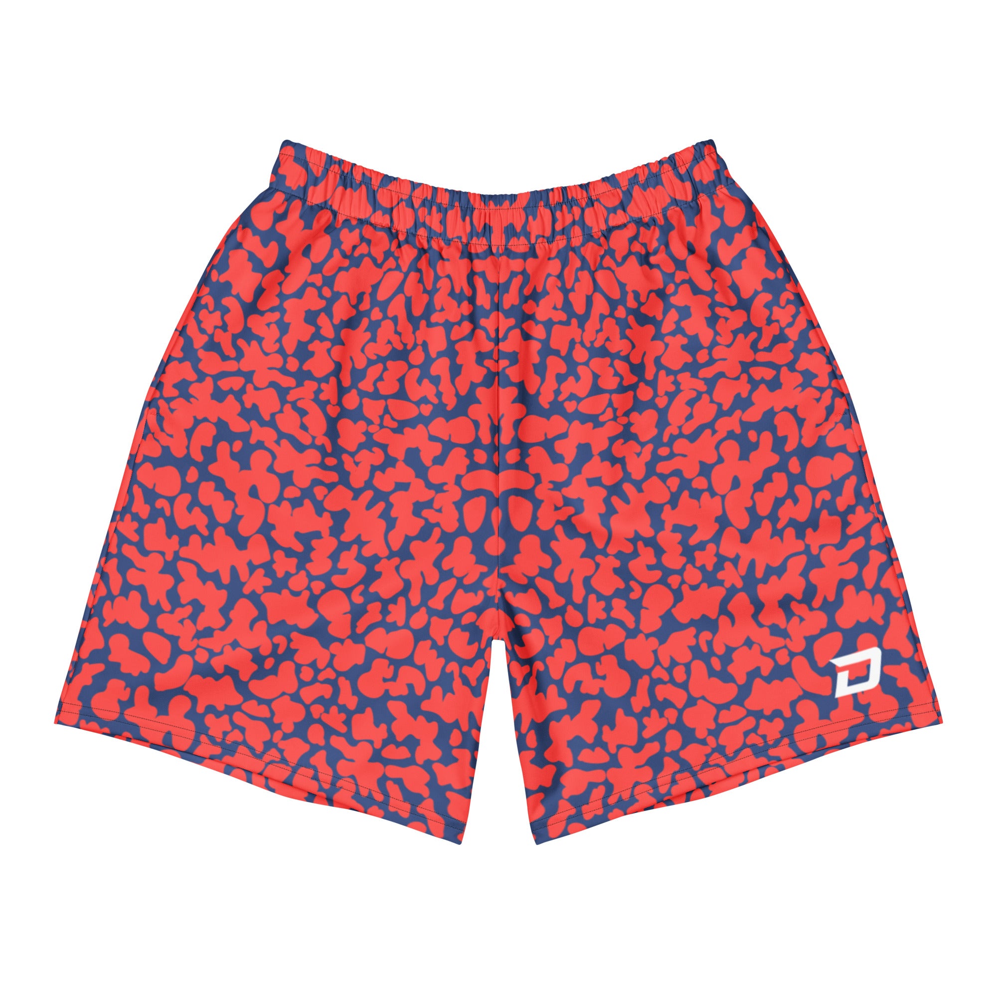 Front view of Dink Air Crimson Performance Shorts featuring a bold crimson and navy abstract pattern with a white D Mark logo on the lower left leg. Premium pickleball performance shorts designed for lightweight comfort, unrestricted movement, and all-day play.