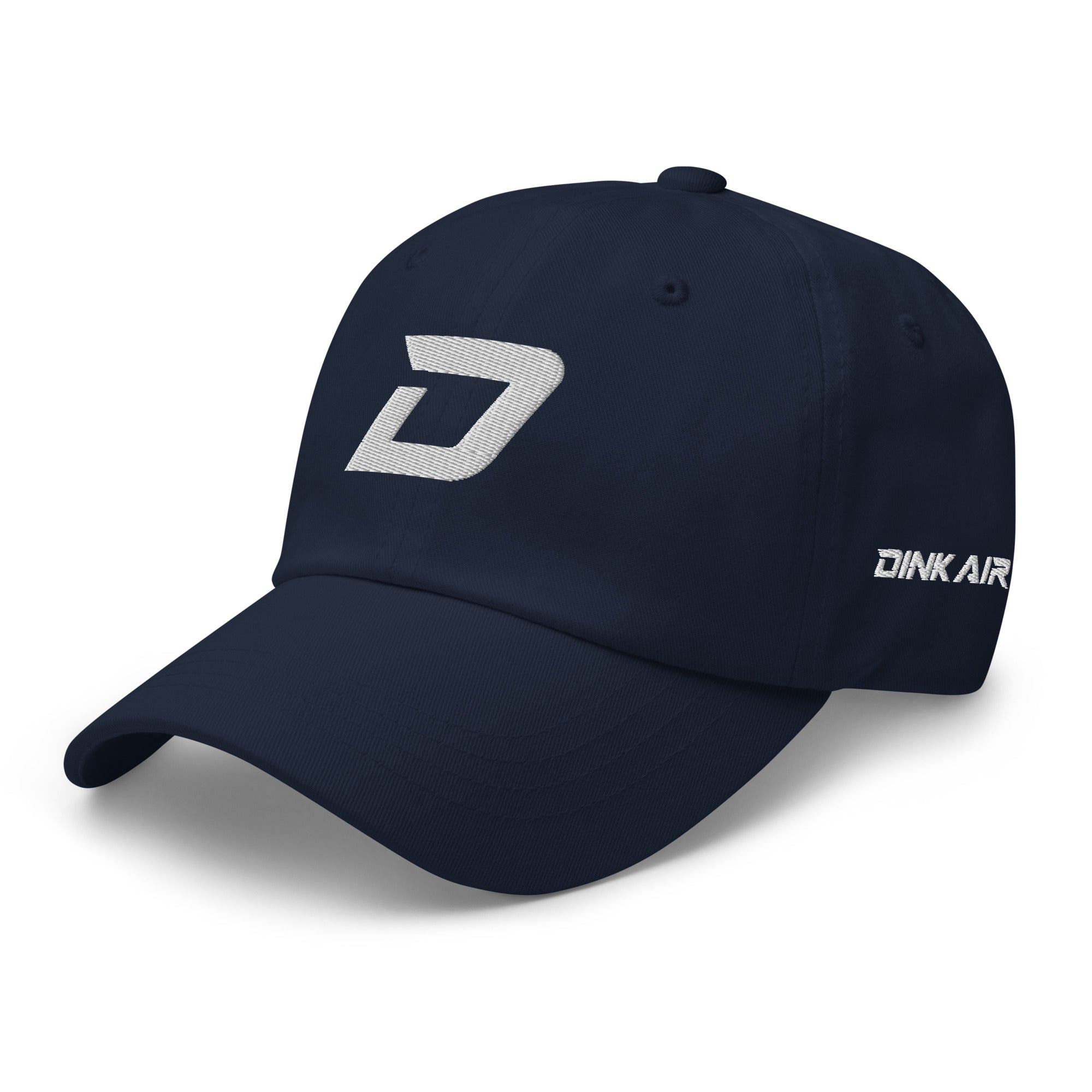 Angled front view of the navy D Mark Classic pickleball cap featuring a white embroidered D Mark logo on the front, an embroidered Dink Air Signature logo on the left side, and a curved brim.