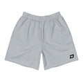 Front view of the Steel D Mark Performance Shorts featuring a light steel gray performance fabric, white D Mark logo near the lower left leg, elastic waistband with drawstring, and a lightweight athletic fit designed for pickleball and everyday performance.