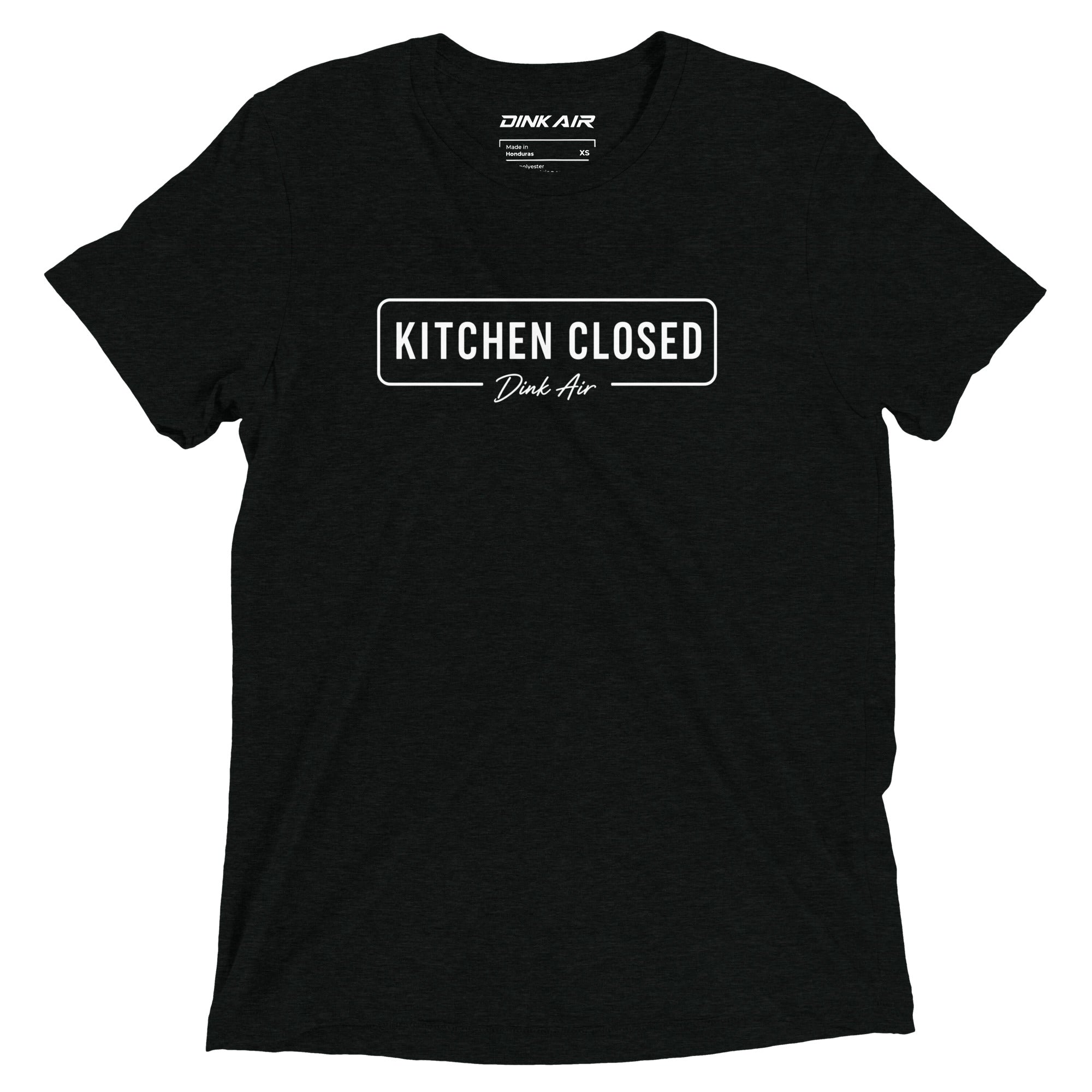 Black tri-blend t-shirt featuring a minimalist "Kitchen Closed" graphic with the Dink Air signature across the front, designed for pickleball players with clean, understated style.