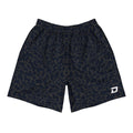 Front view of Dink Air Midnight Performance Shorts featuring a subtle navy and charcoal tonal pattern with a white D Mark logo on the lower left leg. Lightweight premium pickleball shorts designed for comfort, unrestricted movement, and everyday performance on and off the court.