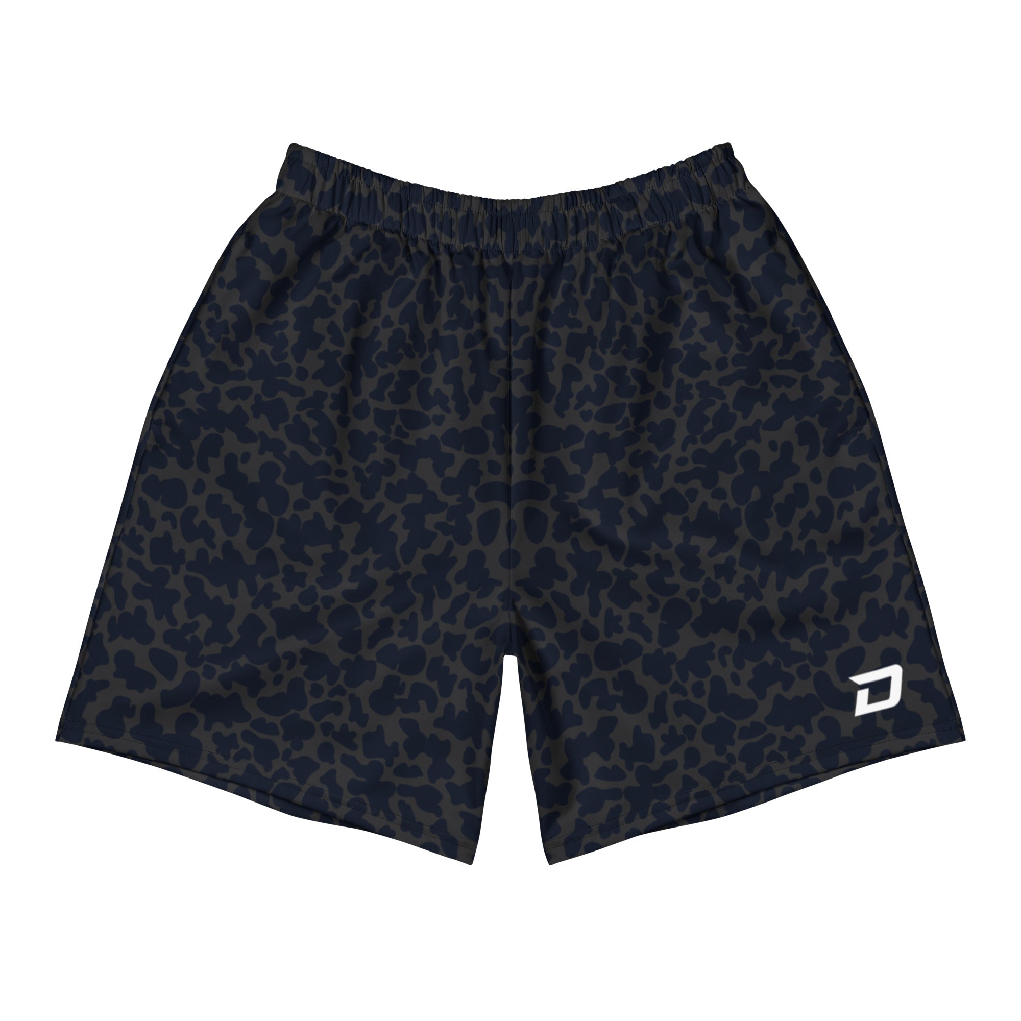 Front view of Dink Air Midnight Performance Shorts featuring a subtle navy and charcoal tonal pattern with a white D Mark logo on the lower left leg. Lightweight premium pickleball shorts designed for comfort, unrestricted movement, and everyday performance on and off the court.