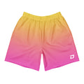 Front view of the Sunrise Performance Shorts featuring a vibrant yellow-to-pink gradient performance fabric, a white D Mark logo on the lower left leg, elastic waistband, athletic fit, moisture-wicking material, and a bold minimalist design for pickleball, training, tournaments, and everyday wear.